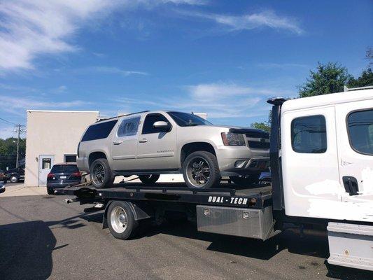 My truck safely at a reputable shop away from Langway. Notice window they couldn't even get to roll up before it left.