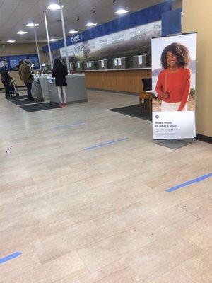 Flatbush-Chase bank branch (the blue line on the floor 6 feet to keep customers away from each other ,corona virus epidemic)