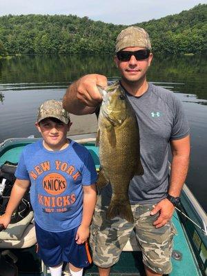 Father an son enjoying some bass fishing