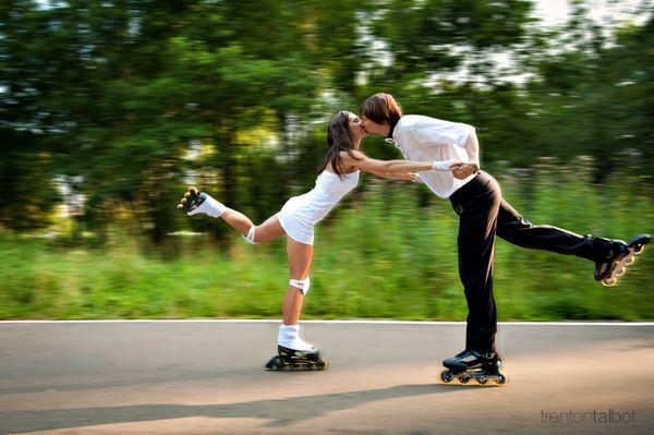 A kiss while rollerskating. Yes, it's a wedding photo, and this is bride and groom. I'm blessed with crazy clients!