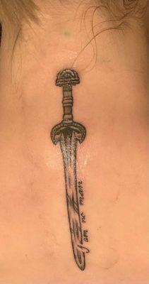 Eowyn's sword and quote from the Lord of the Rings. So excited to see it all healed!