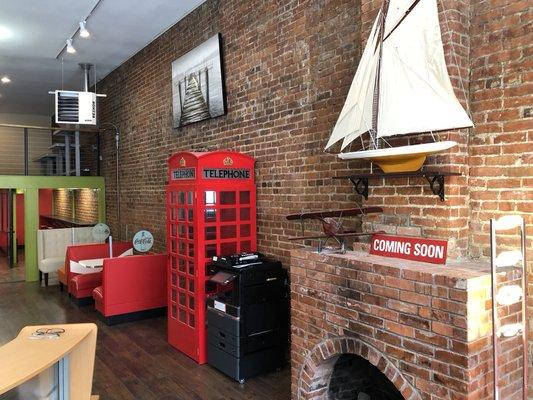 No fun and funky office is complete without a red British phone booth.