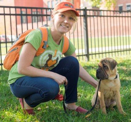 Emily the dog walker and her dog buddy Max.  Having an awesome time walking to the park. Part of our super dogwalkers team.