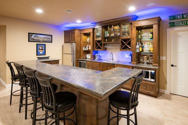 custom built bar with custom cabinetry, wine and liquor storage. Custom Built home in the Fox Valley area.