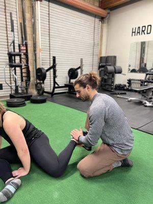 Working on hip Internal rotation end range strength with olympic weightlifter Kaylee.