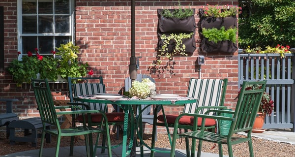 Outdoor room designed for Jamaica Plain clients. Includes wall hanging planters.