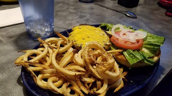 Hamburger and curly fries.