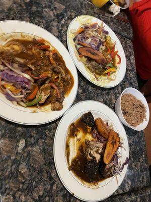 Oxtail, curry goat and jerk chicken...waited too long before I took the picture, food was amazing.