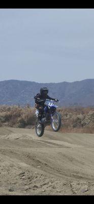 Thomas catching air on the kids track.