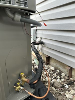 Unprofessional condenser line install and wiring exposed