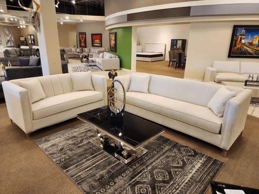 The Crestmont Sofa and Loveseat is truly a love connection of style and class with a tall design arms and back.