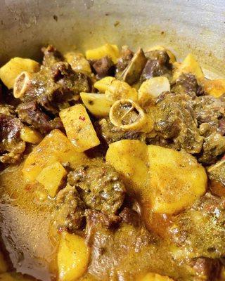 Curry goat with potatoes