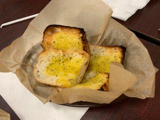 Burnt bread. If I were a server I wouldn't have taken it out of the kitchen.