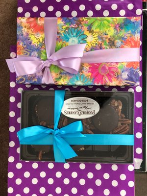 Assorted 1/2 pound chocolates and dark chocolate pecans