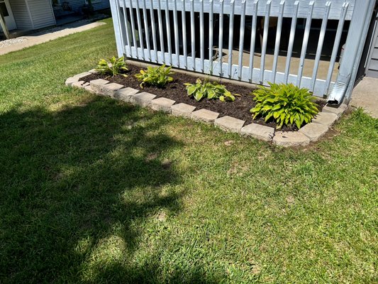 Let us help you upgrade your garden or flower bed with a nice retaining wall.