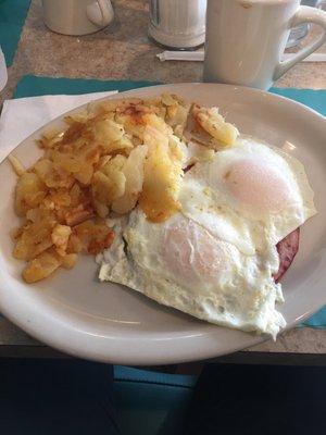 2 eggs with ham come with home fries and toast.