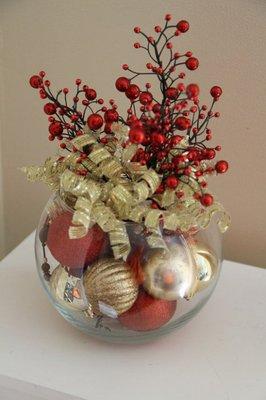 Gold, Silver, and Red with holly berries and a gold bow