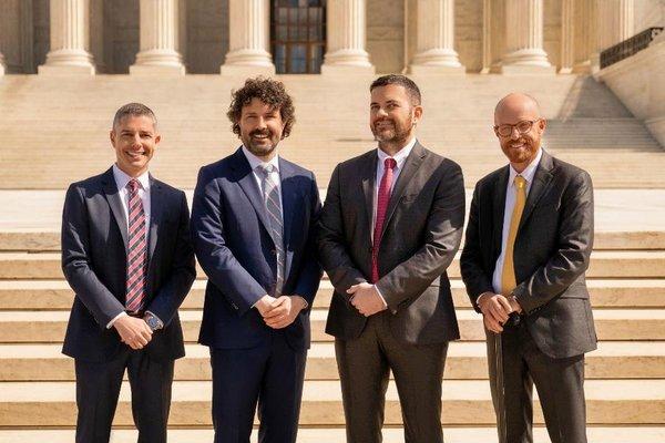 Werner, Hoffman, Greig & Garcia team in front of US Capitol building