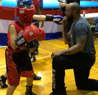 Coach Larry before a kids boxing match