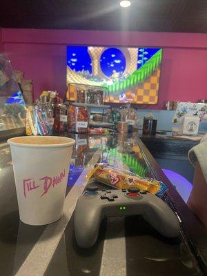 Delicious vanilla latte, candy and some video game action