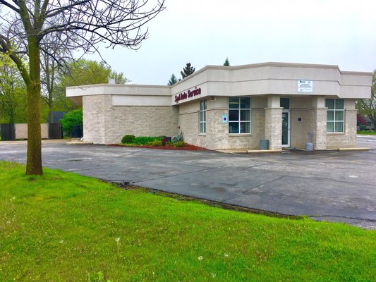 View from Main; entrance and parking lot