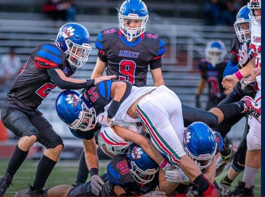 Football game in action.