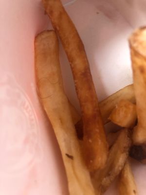 I was eating my " Natural-cut French Fries" and I found a hair in it.-disgusting