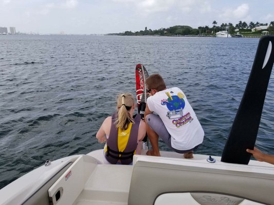 Jason helping my daughter with her skis.