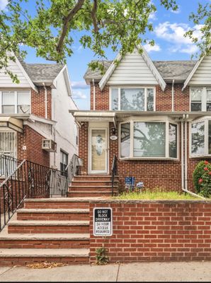 A rare beauty in dyker heights! 4-5 bedroom 4 full baths, custom eat in kitchen. All brick. Set garage!