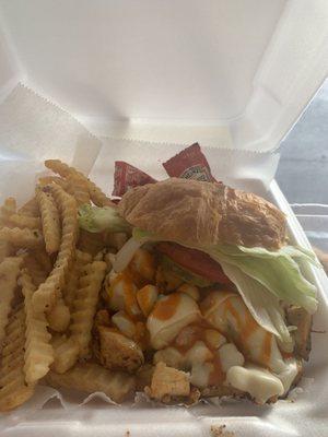 Da'Gordon's grilled chicken Philly all the way combo with fries, onions rings.