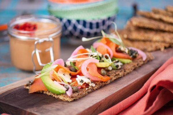 Smoked salmon and avocado on Flax crackers