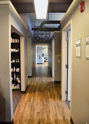 Hallway leading to treatment rooms and rehab area