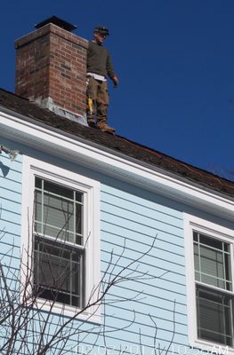 Mal Completing New Brick Refacing repairs to Our Woodstove Chimney & applying Cold Weather CrownCoat.