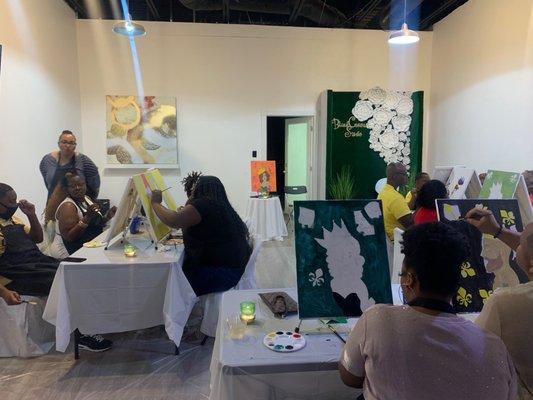 Interior - during a Paint n' Sip event! This space can be used for any event you want to have