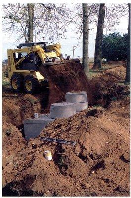 Septic construction... this is showers plumbing working at a septic installation