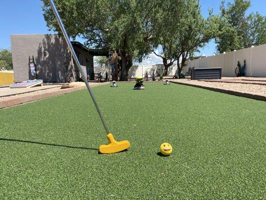 Test your skills on the putt-putt green.