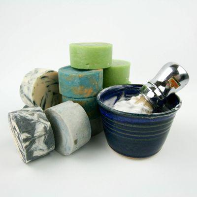 Shaving soap, bowls and brushes.