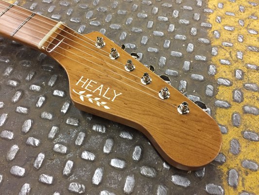 Healy Healer neck and headstock made with Torrefied Maple.