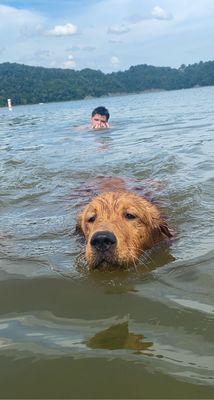 My kiddo & the puppy love to swim!