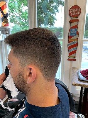 Short summer herrcut  with a soft scissor blend