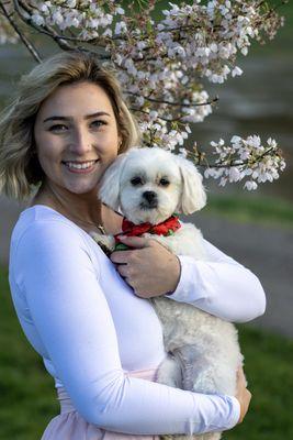 Beautiful young lady and her sweet puppy bonding while get sweet photographs together!