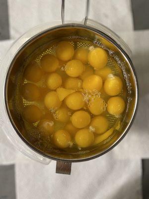 The Eggs get sifted thru a large chinois strainer daily...