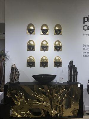 Look at the Gold and Black Chinese Metal plagues.  Can you see them on your wall.