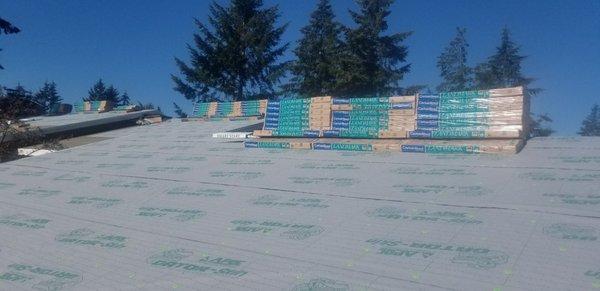 Shingles delivered and staged for the job.