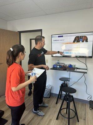 After her custom test, Adriana reviews the data with one of our certified BodymetRX Analysts.