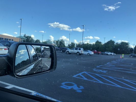 Passenger side glass and side view mirror filthy.