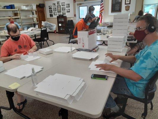 Valley Sheltered Workshop employees completing box tasks