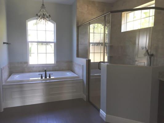 beautiful master bathroom in this custom built home