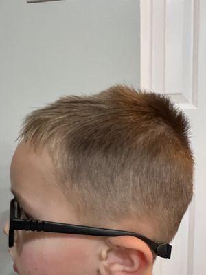 My kid's haircut could not be more uneven