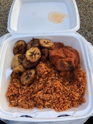 jollof rice, fried plantain, goat meat